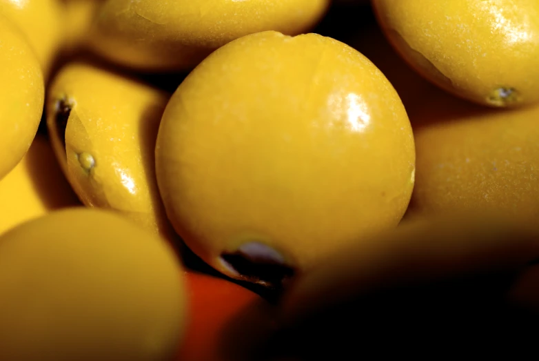 the large pile of yellow bananas has ripe ones