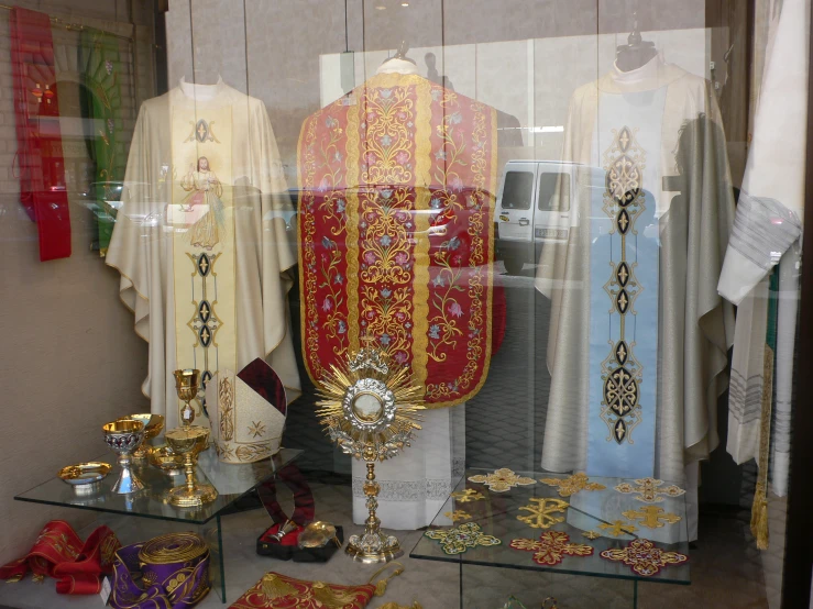 some type of clothing on display in a glass case