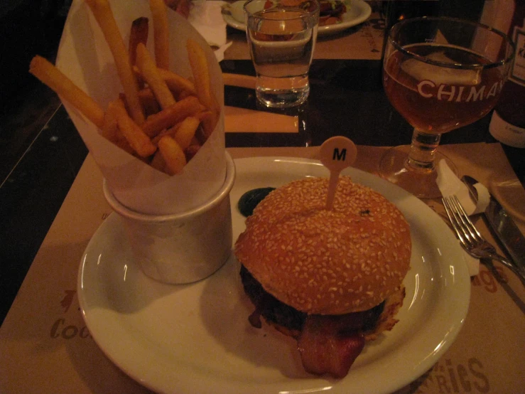 a plate with a burger and fries on it