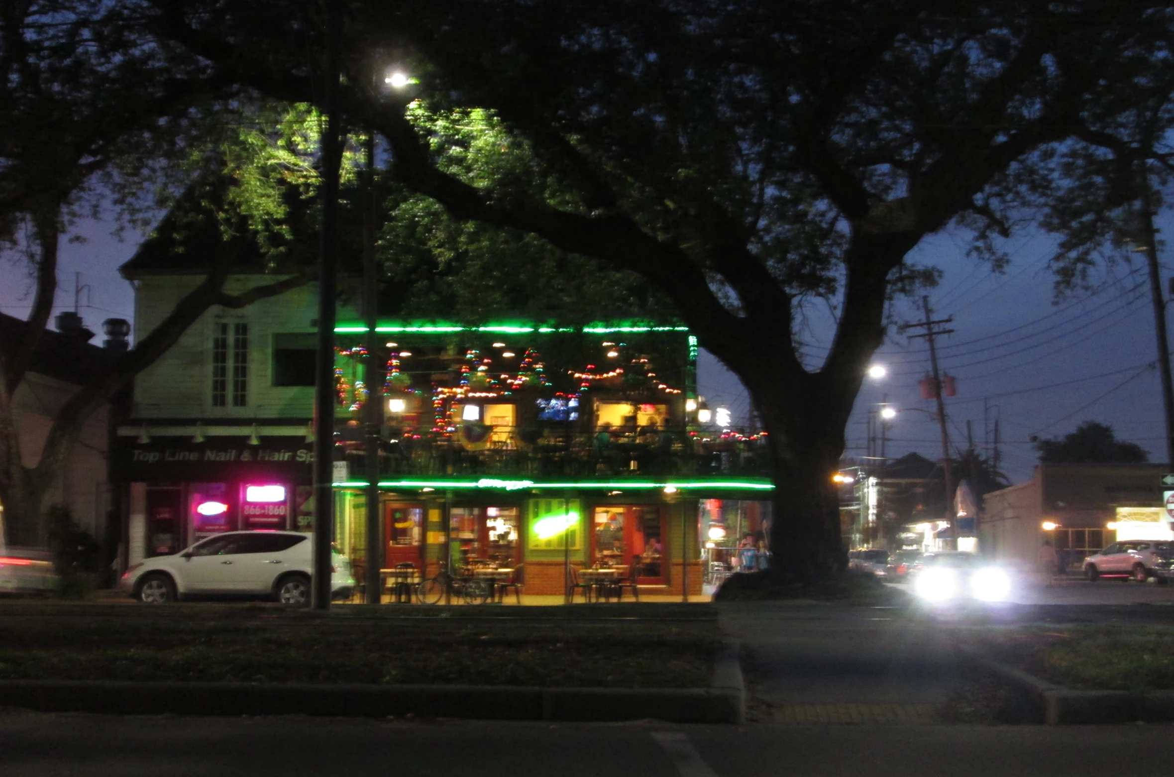 a building with christmas lights and lights on it