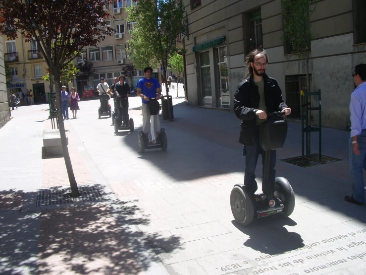 a lady on a segway in the city