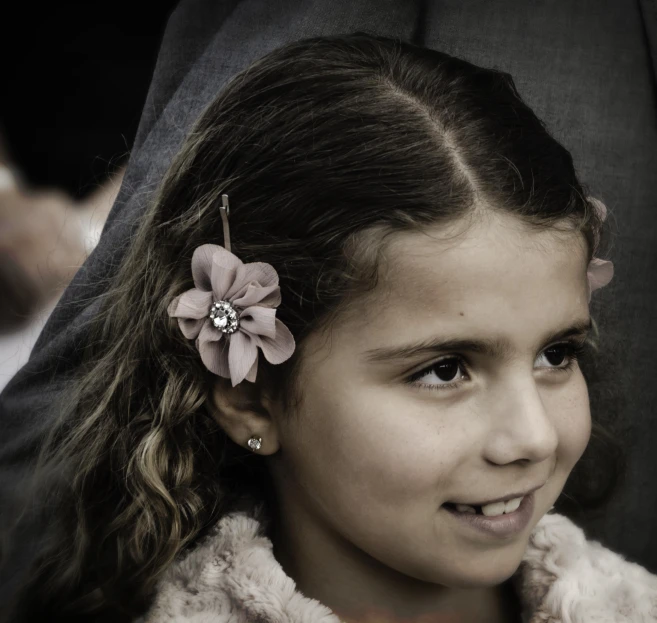 a close up of a child smiling for the camera