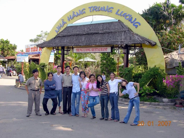 a group of young people standing next to each other