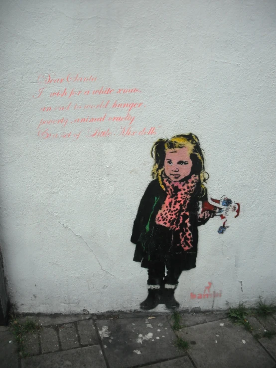 the little girl is painted on the wall