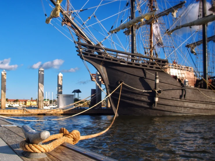 a boat is docked in a harbor near a dock