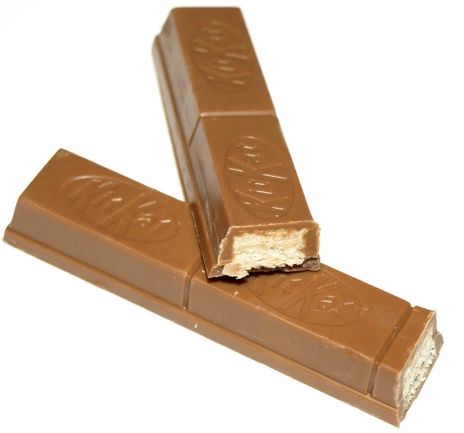 a chocolate bar with slices of vanilla on it