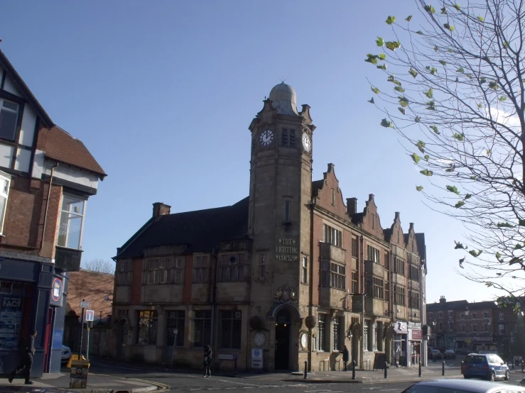 a clock tower is seen on the building