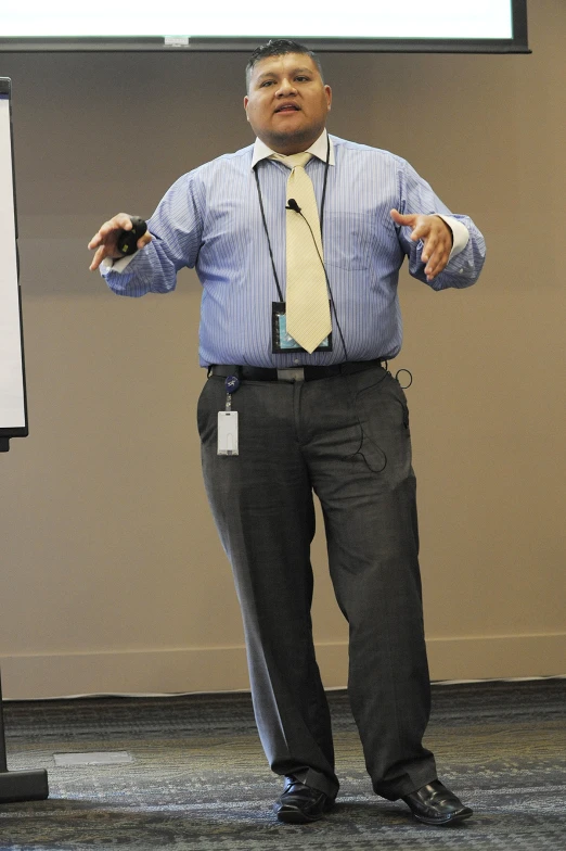 a man giving a presentation with his hand out