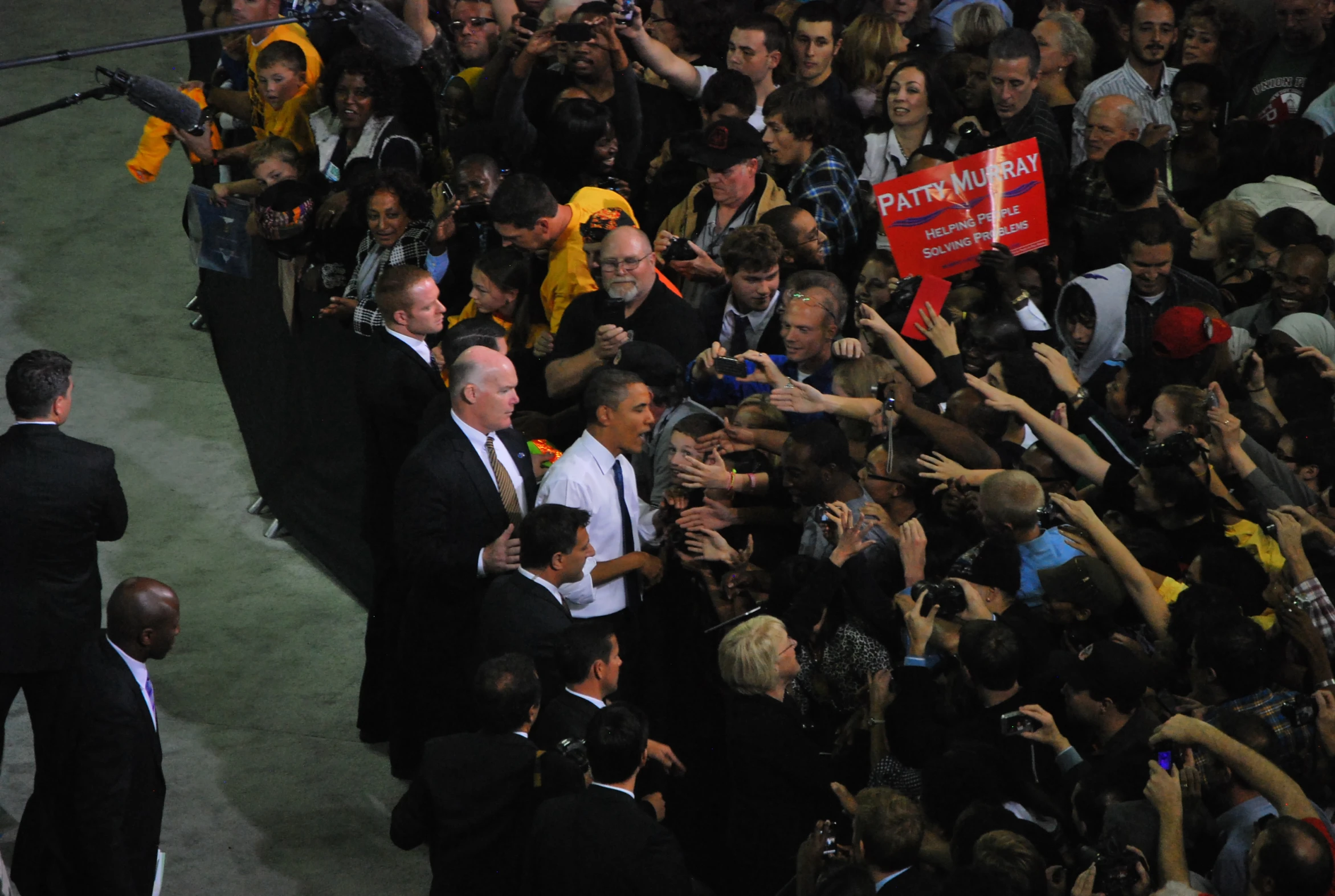 president obama at the end of a campaign rally