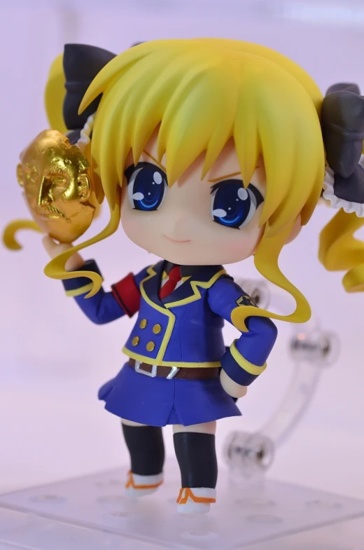 doll figurine that has been made to look like it is in uniform