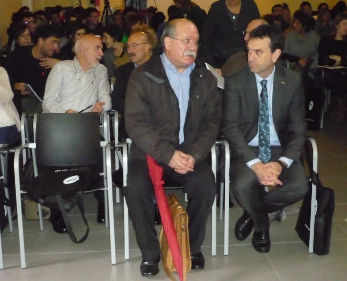 there is an image of an audience in the courtroom