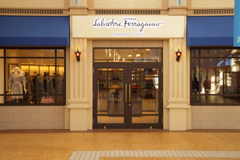 a storefront with the doors open for the women's store