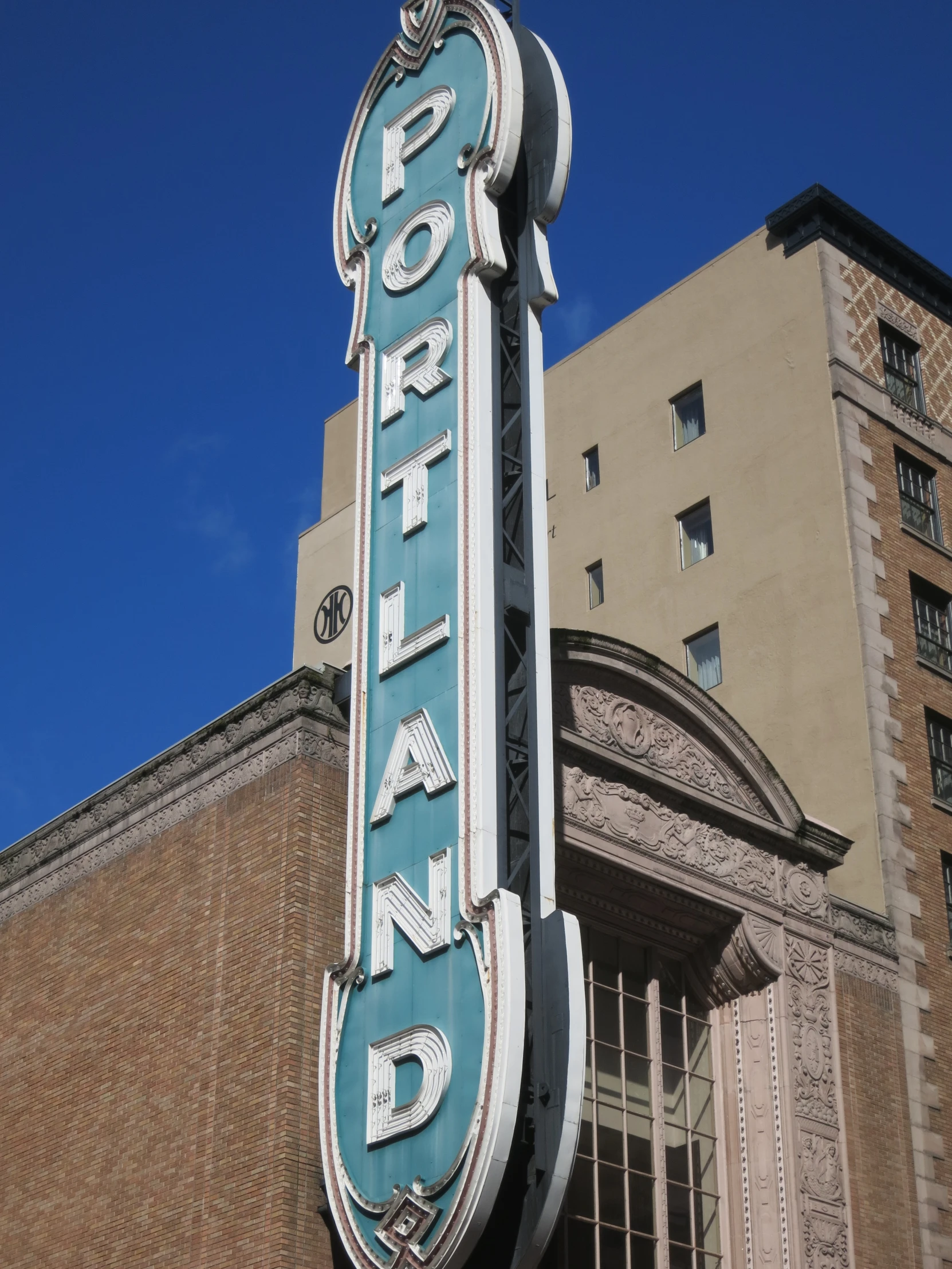 the marquee on a building reads portland