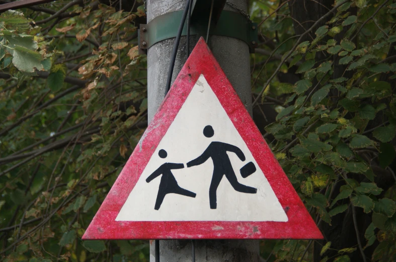 warning sign for children crossing in the street