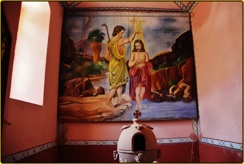 the painting of jesus on the wall is in an art installation