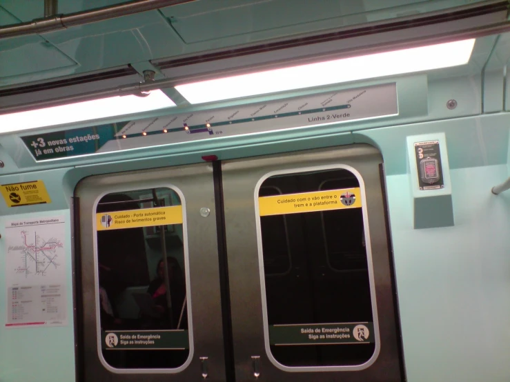 the doors to the inside of a subway train