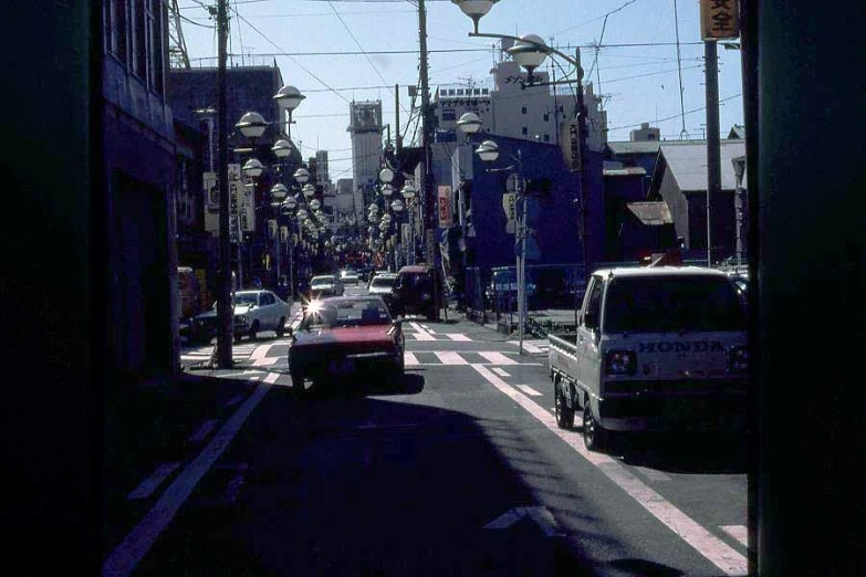 a car that is sitting in the middle of some street