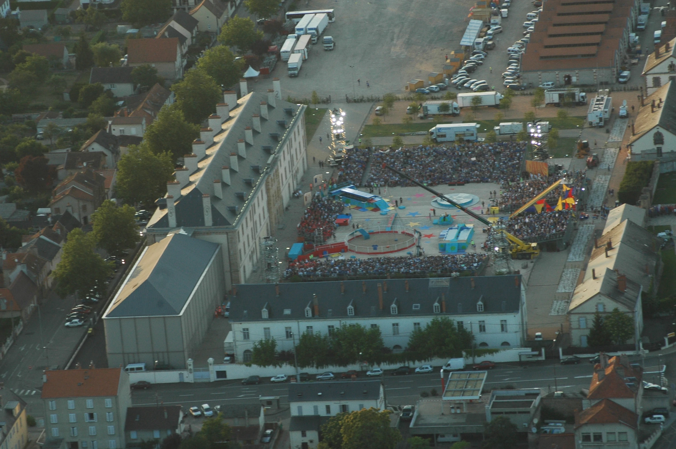 aerial view of city with colorful carnival park