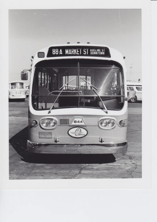 a man standing in front of a bus