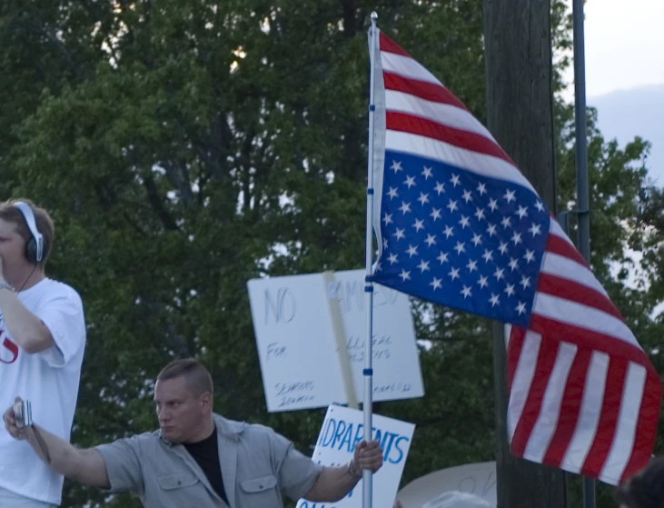 a person that is holding some kind of flag