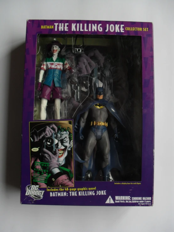 a batman action figure is packaged in a box