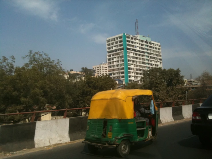 two buses that are sitting in the street