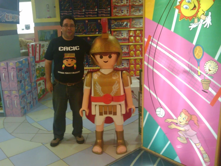 a wooden statue in the shape of a child's cartoon character