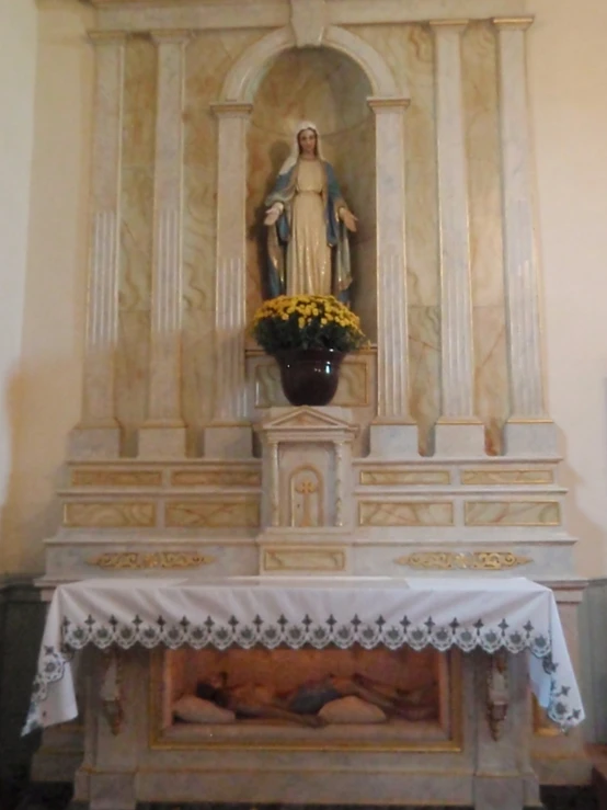 statue of a religious person, inside a church