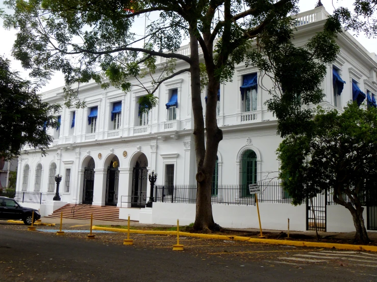 the house is in an upscale area with white walls