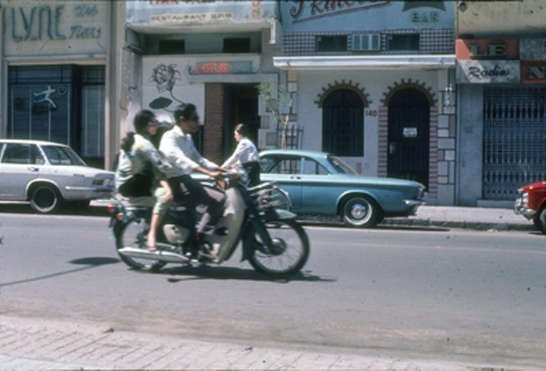 the men are on their motorcycles on the road