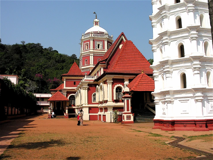 a very large building with an interesting pointed roof