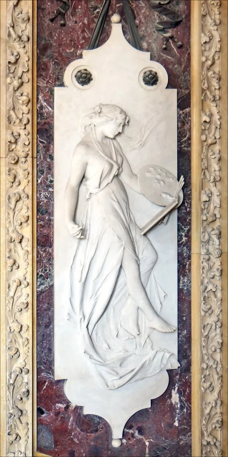 a carving of a woman carrying a dish in a marble frame