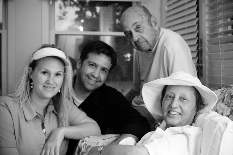 black and white po of a family posing