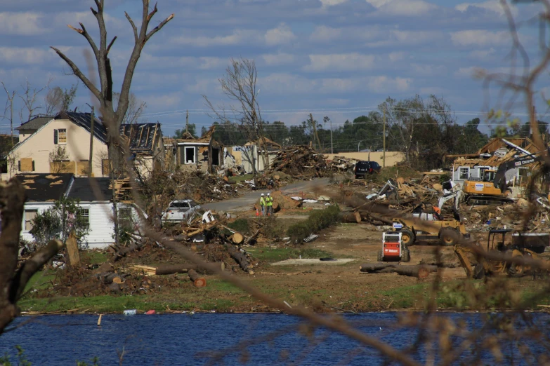 a residential area with debris around and homes