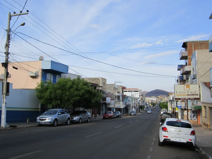 small city street with cars on a street