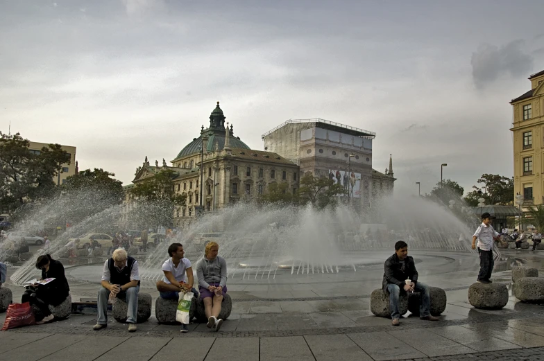 a bunch of people sitting around and having some fun