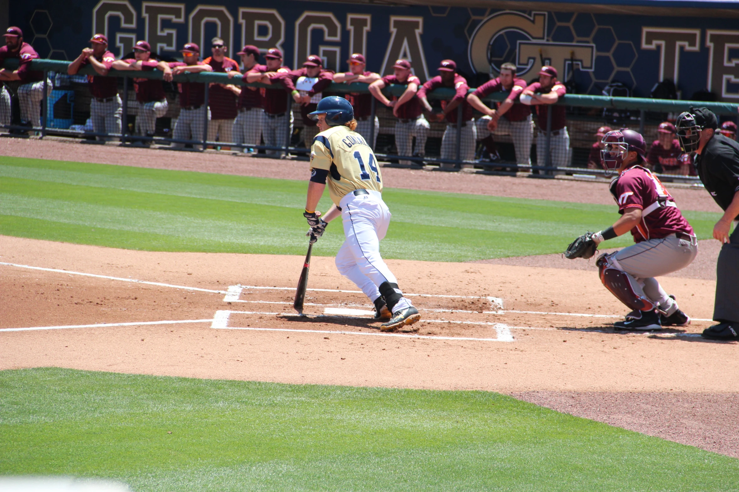 there is a male baseball player that is standing in the batters box