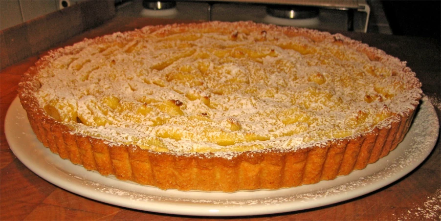 a close up of a cake on a plate on a counter