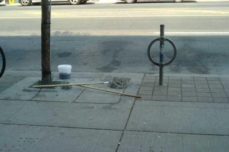 the fire hydrant in the street is left on the sidewalk