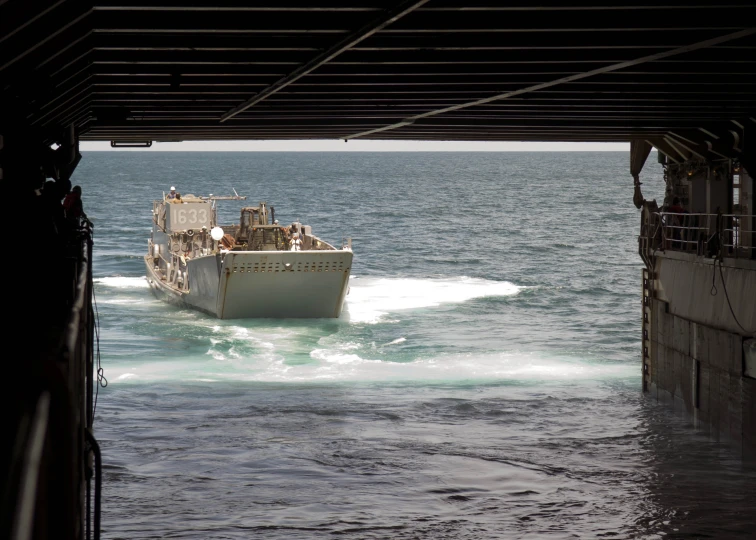 a boat is riding through the water