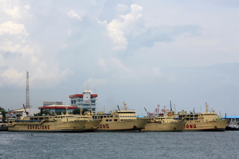 there are two ferry boats next to each other