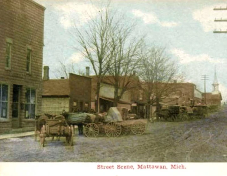 a pograph from the 1800's of an antique street scene