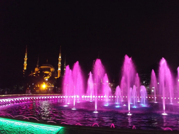 a fountain with lots of bright colorful water