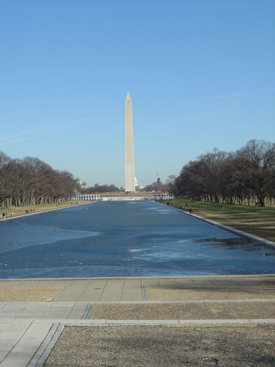 a view of the washington monument and reflecting pool