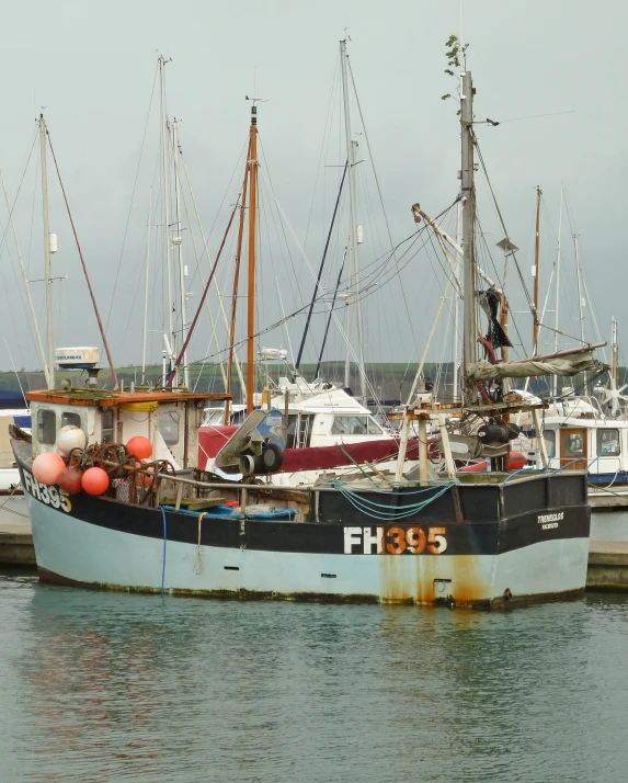 a couple of boats docked in the water