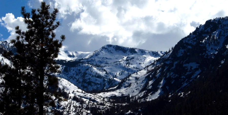 the view from the top of a hill, with snow on it