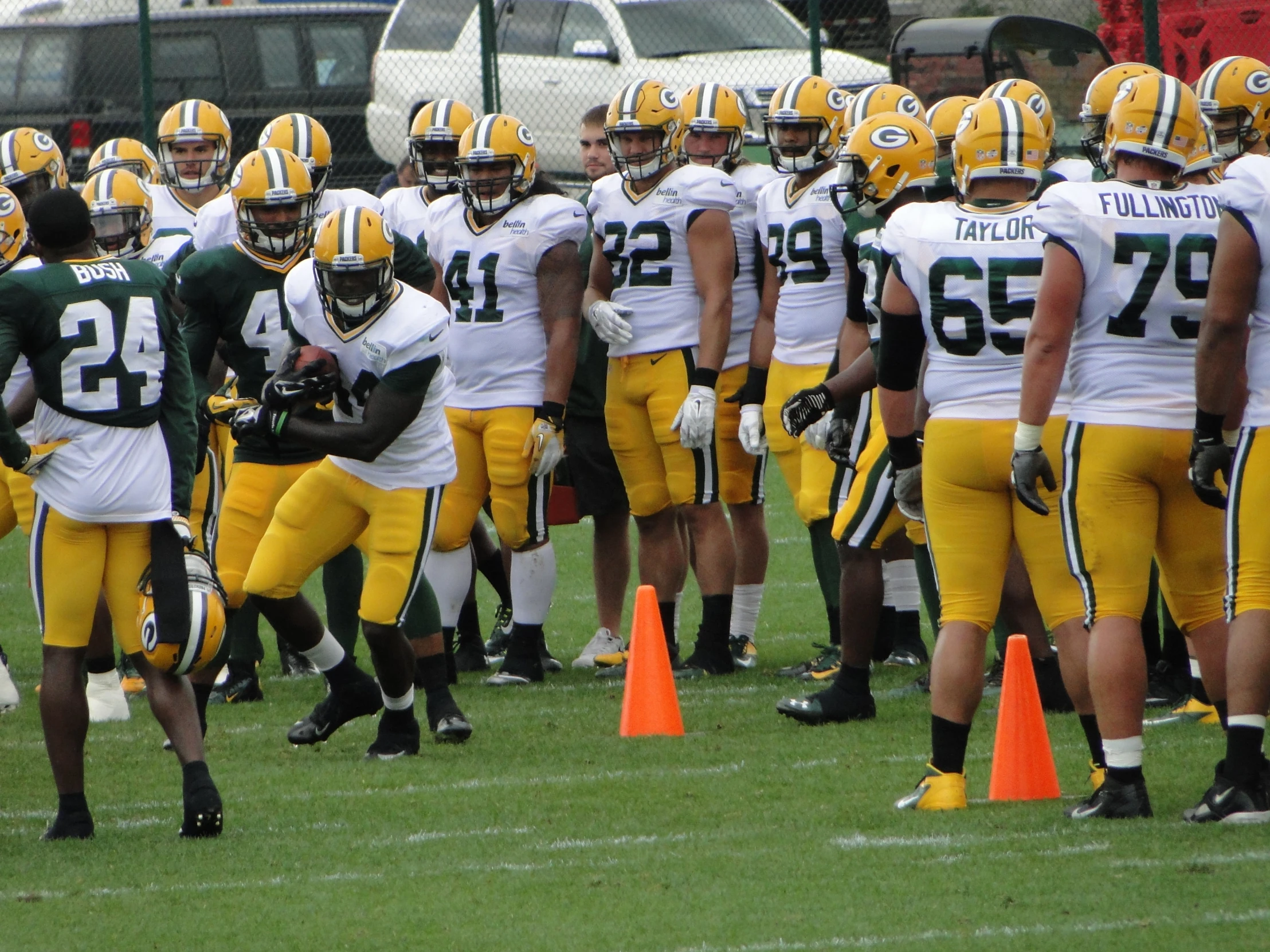 several people on a field in uniforms