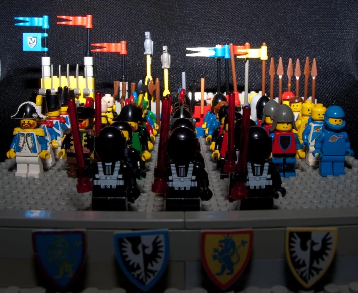 several lego knights displayed on a lego shelf