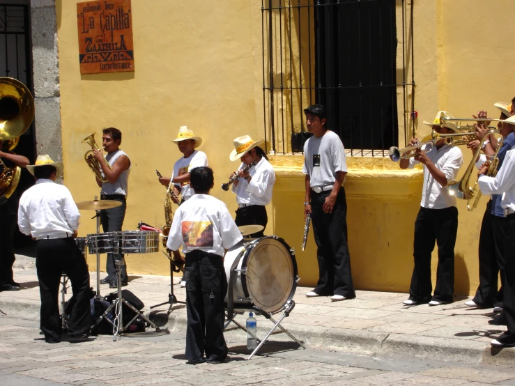 a band with ss instruments on the side walk