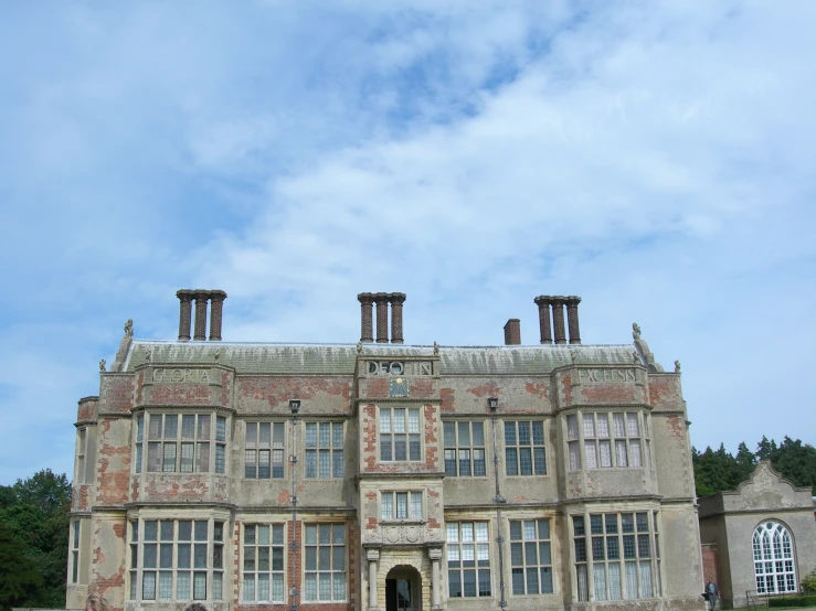 a large old building with a clock on it